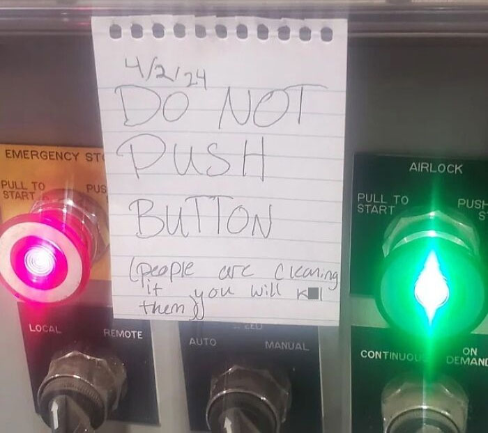 "Handwritten warning note on a control panel saying 'Do Not Push Button,' illustrating something dangerous."