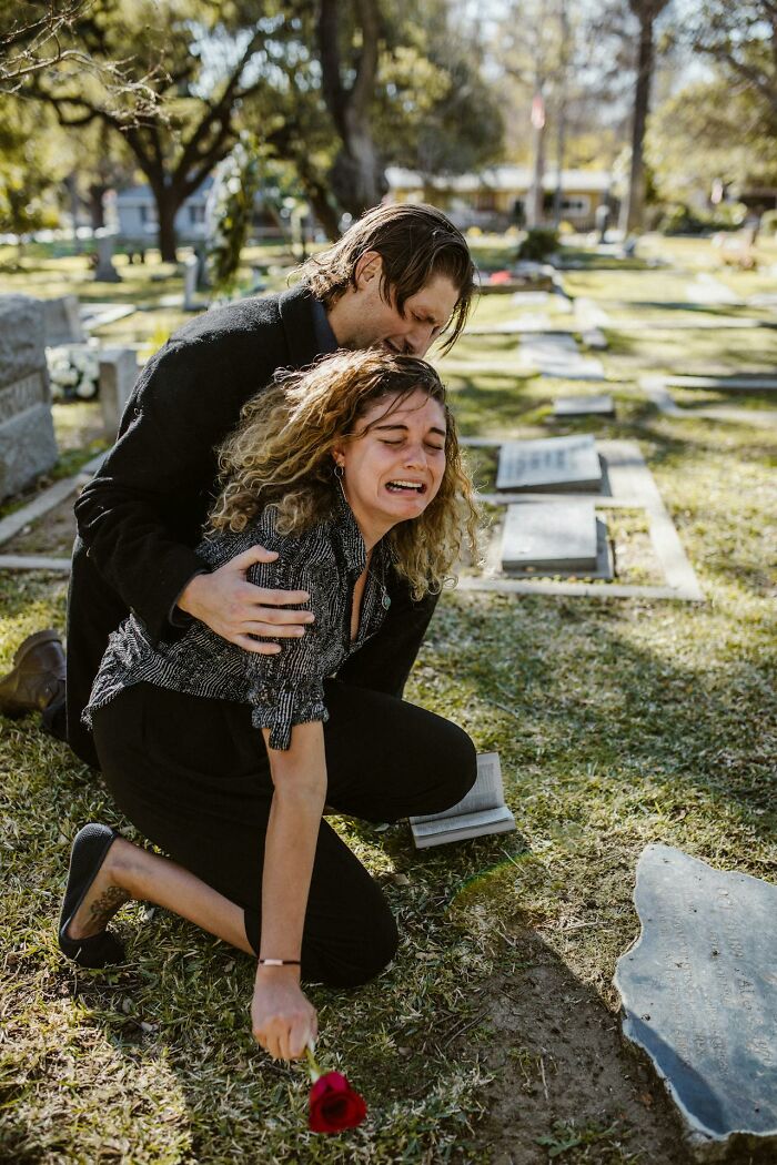A grieving woman and man at a grave, highlighting something more traumatizing than people realize.
