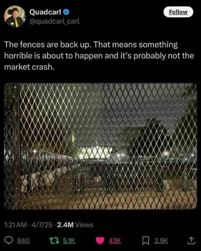 A tweet expressing dissatisfaction with capitalism, featuring a photo of a fence at night with lights in the background.