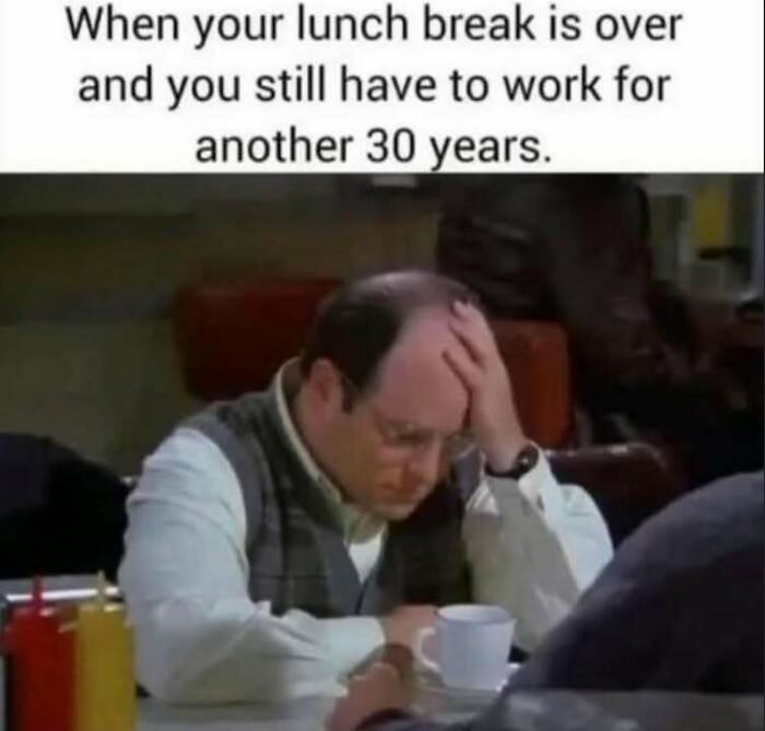 Bald man in a vest at a diner, holding his head in frustration; funny meme about long work life after lunch break.
