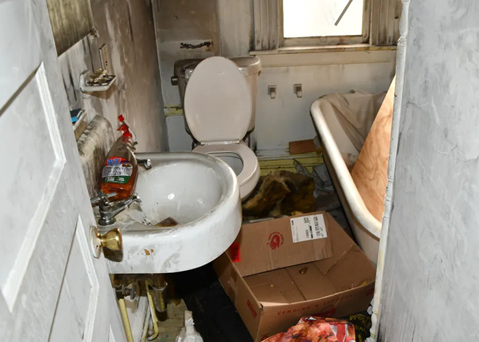 Disturbing photo of a neglected bathroom in the horror house where a stepson was reportedly held captive.
