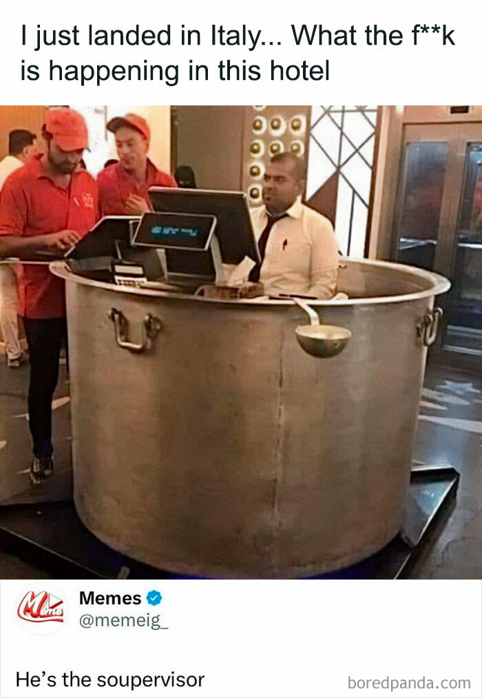 Man standing in a giant soup pot setup, resembling a hotel reception, creating a funny meme moment.