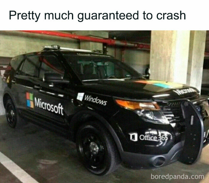 SUV with Microsoft, Windows logos, humorously described as likely to crash. Relatable meme scene in a parking garage.