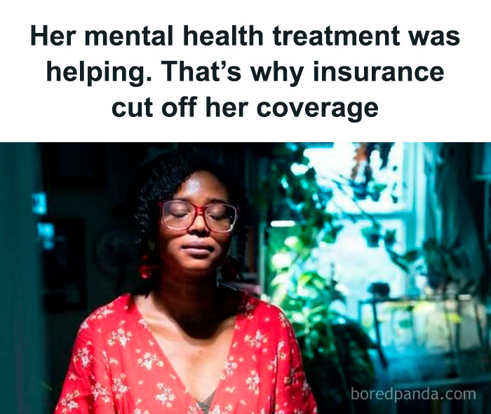 Woman in red dress sits calmly in a dim room with plants and books, focusing on mental health amidst insurance challenges.