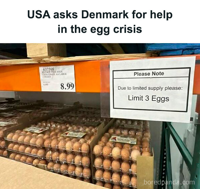 Egg supply limit sign above cartons in a store shelf amid crisis discussions.