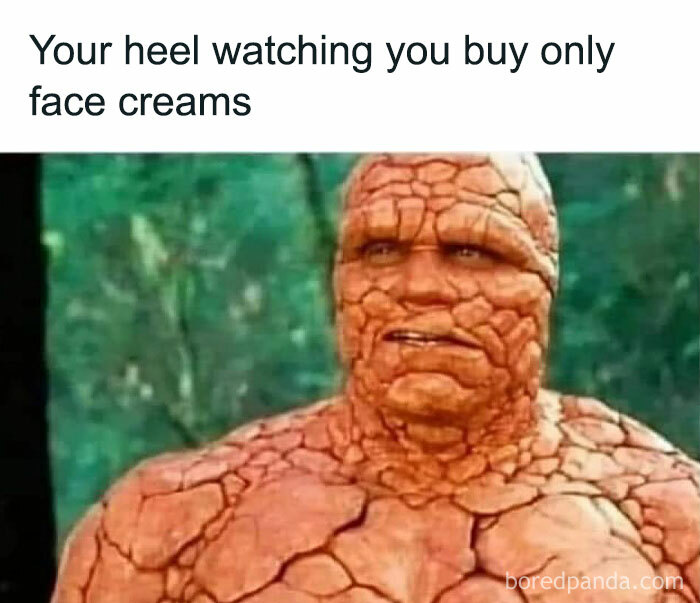 C*****d-skinned character comparing heel dryness to buying only face creams, relating to skincare woes.