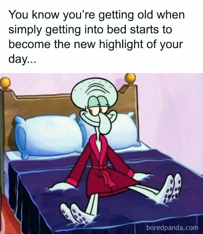 Cartoon character in a red robe sitting happily on a bed, highlighting a relatable moment about aging.