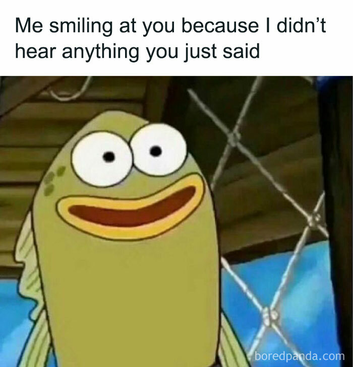 Cartoon fish smiling awkwardly, capturing a relatable meme moment.