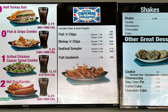 Vintage restaurant menu featuring Arthur Treacher’s Fish & Chips, burgers, and shakes.