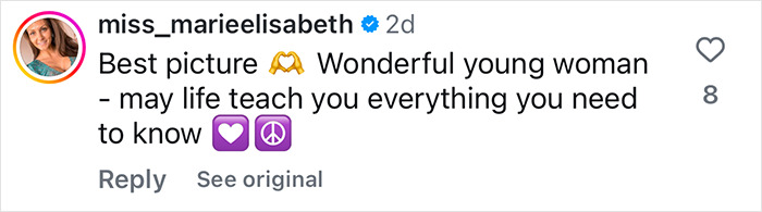 Comment praising a young woman, featuring emojis of folded hands, a heart, and a peace symbol.