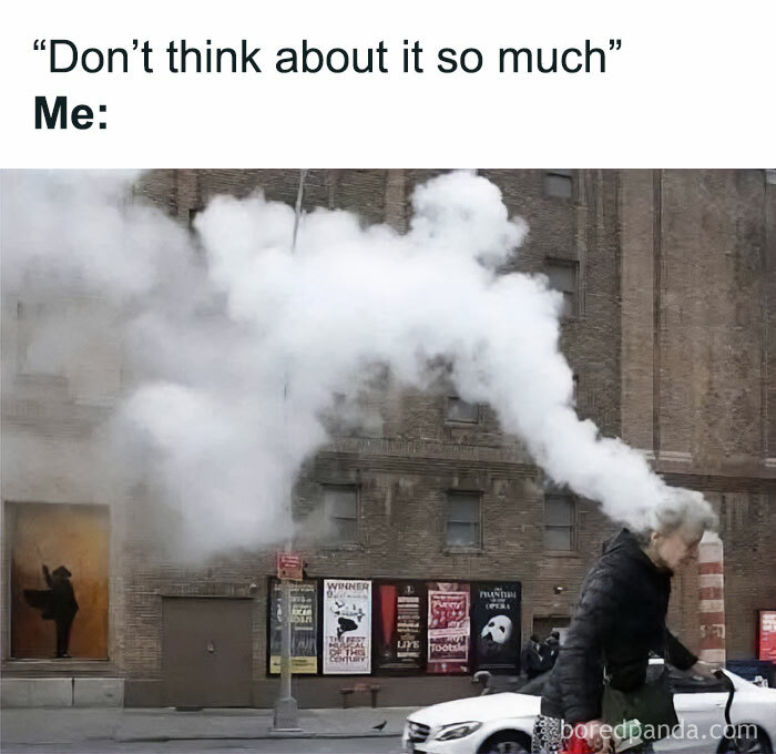 Person walking on city street with large cloud of steam around head, illustrating funny random shower thoughts concept.