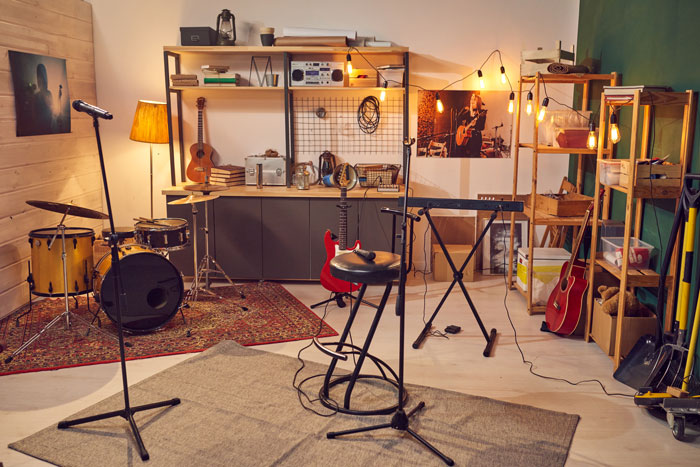 Music studio with instruments and equipment organized to prevent siblings from destroying stuff. Music studio with instruments and equipment organized to prevent siblings from destroying stuff.