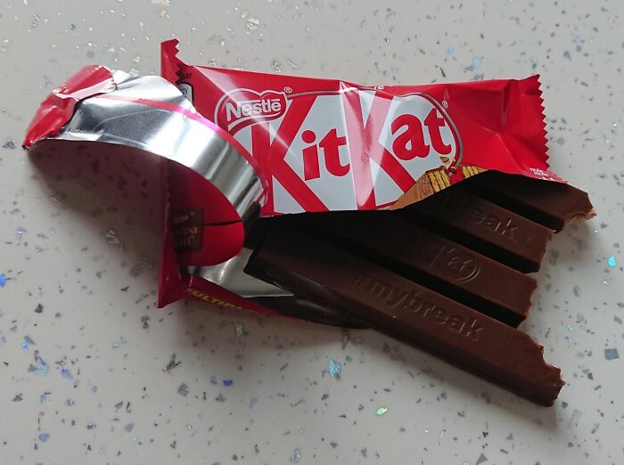 KitKat opened incorrectly, a legal act causing discomfort with psychopath vibes.