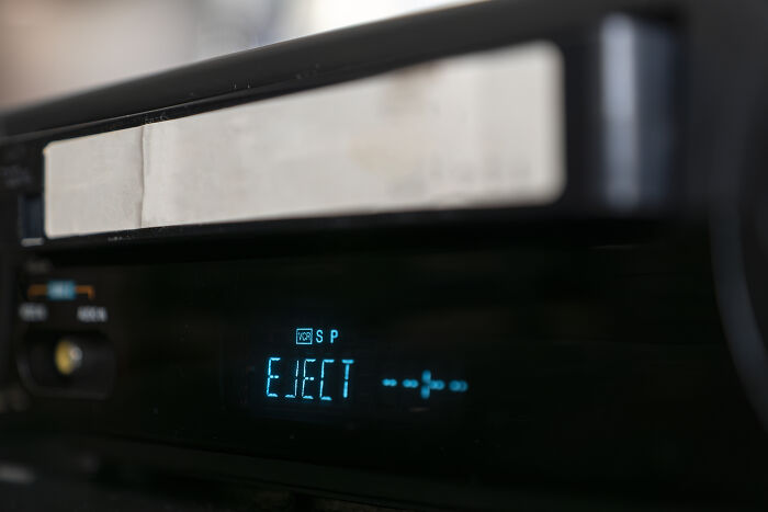 VCR displaying "EJECT" symbolizing an adult moment explanation in technology nostalgia.