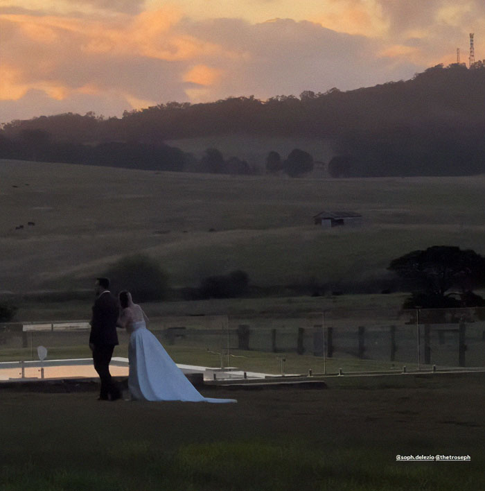 Miracle burns survivor during wedding weekend at sunset in a scenic countryside.