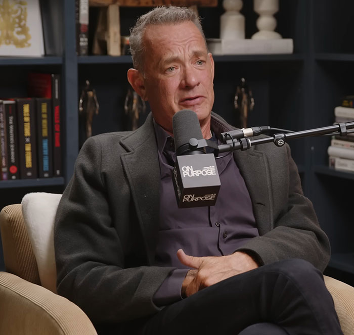 Actor discussing childhood experiences on a podcast, emphasizing themes of confusion, violence, and deprivation.