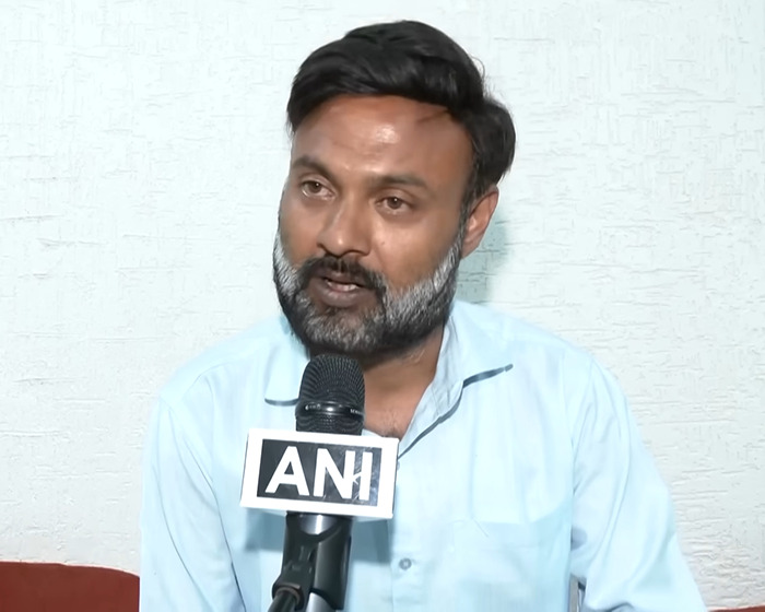 Man speaking into an ANI microphone during interview about horrifying viral video of tourist smiling while zip-lining tragedy unfolds below