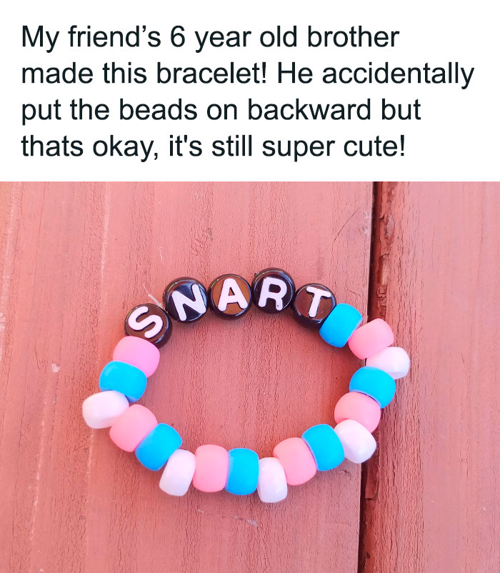 Child's handmade bracelet with "SNART" spelled out in beads, showcasing a hilarious random meme moment.