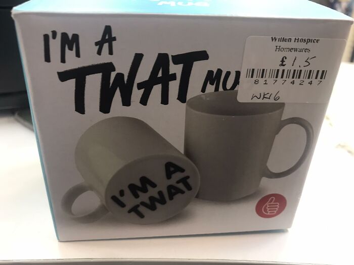 Mug with humorous text found in secondhand shop, labeled "I'm a t**t", priced at £1.50 in charity store.