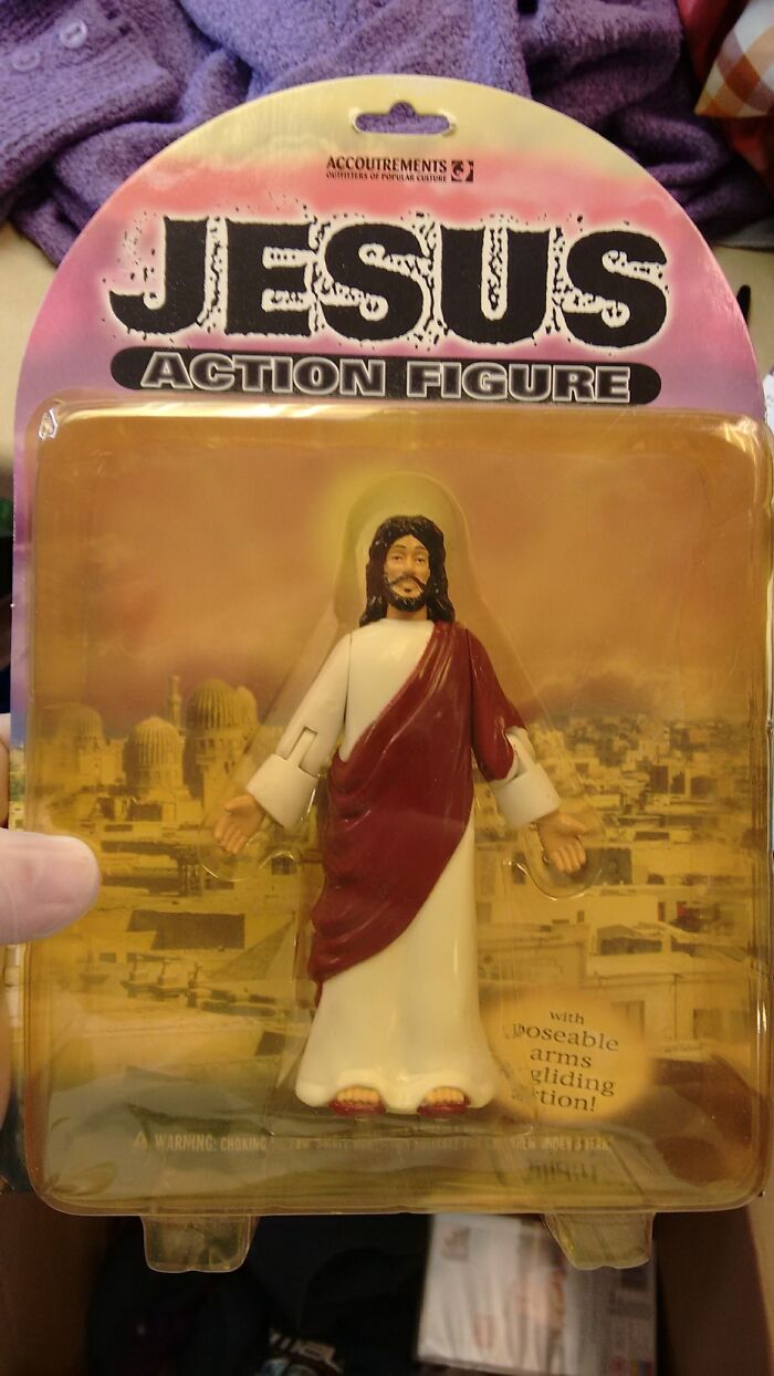 Jesus action figure in packaging found at a secondhand shop, featuring poseable arms.