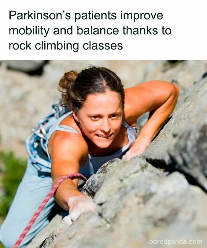 Woman rock climbing, showcasing positivity and determination, highlighting benefits for Parkinson's patients.