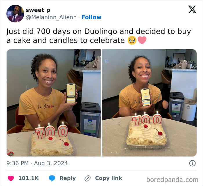 Person celebrating 700 days on Duolingo with a cake and candles, capturing pure and uplifting moments.