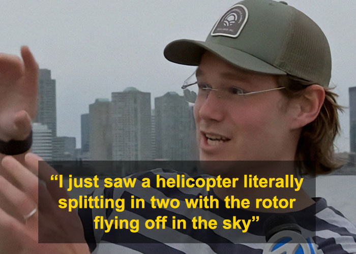 Witness recounting NYC helicopter crash details with skyline in background.