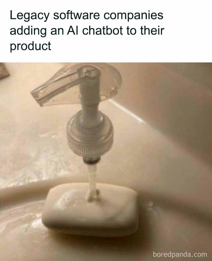 Soap dispenser comically placed over a bar of soap, depicting relatable work meme humor.