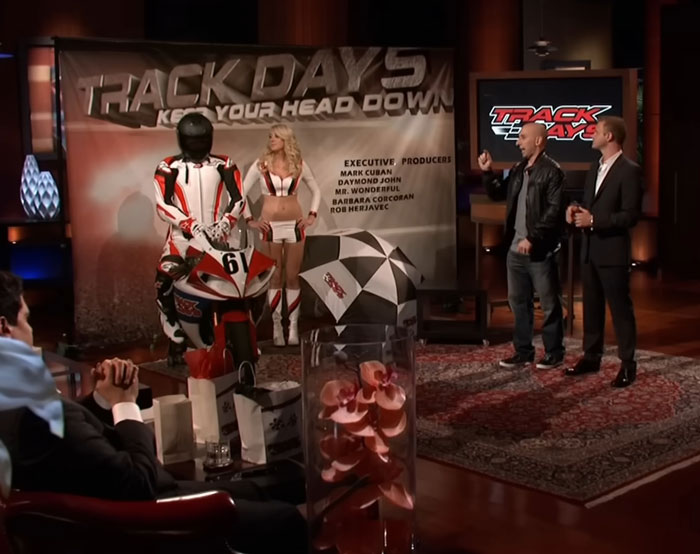 Pitching the Trackdays motorcycle safety product to investors on a Shark Tank episode about Shark Tank products that flopped.