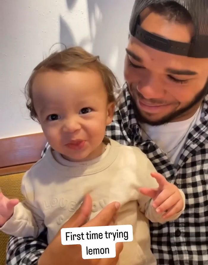 Father holding smiling toddler, labeled "First time trying lemon," related to TikTok star's tragic passing.