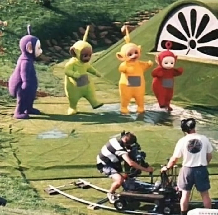 Teletubbies being filmed on set, revealing a new perspective on this famous children's show creation process.