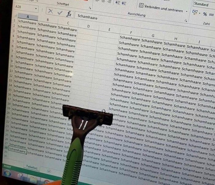 Razor held in front of a computer screen filled with repeated text causing a blursed visual effect that may confuse the brain.