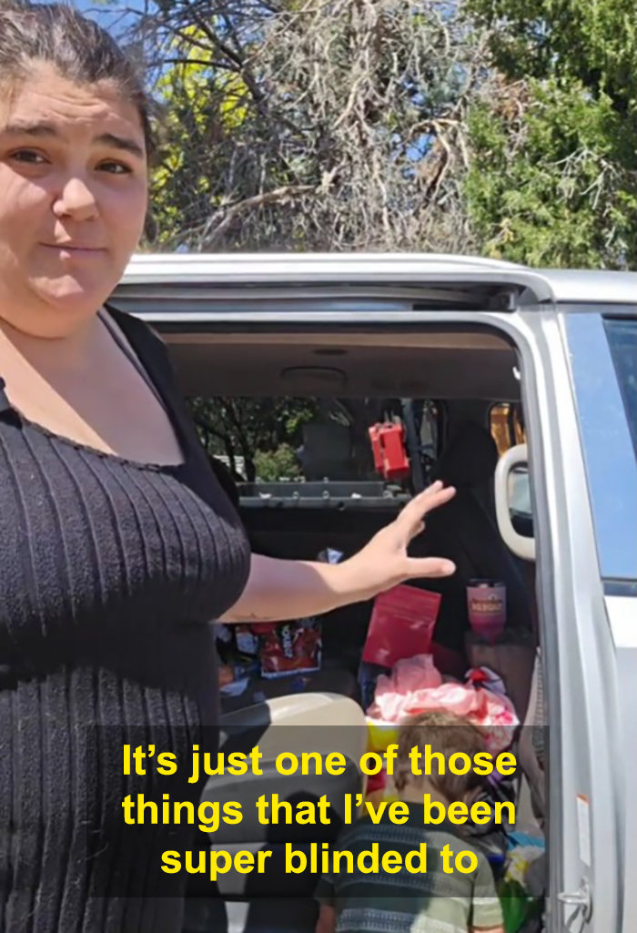Woman cleaning out filthy car explaining her experience while dealing with internet reactions to mom comments.