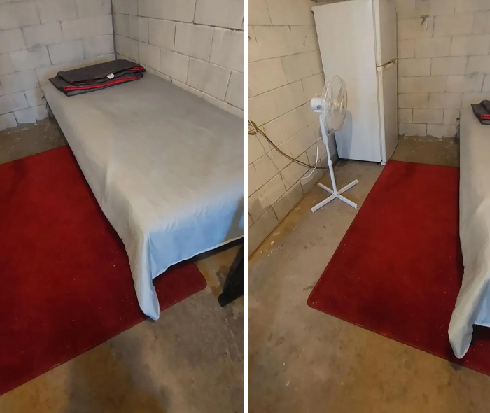 Small, poorly furnished rental room with concrete walls and floor, basic bed, fan, and red rug, illustrating bad landlords' neglect.