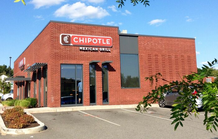 Chipotle Mexican Grill restaurant exterior on a sunny day, illustrating a company secret you can share now.