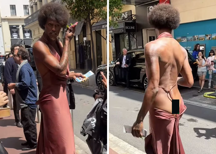Person in a backless dress revealing backside on a street, breaking Cannes dress code to mass applause from onlookers.