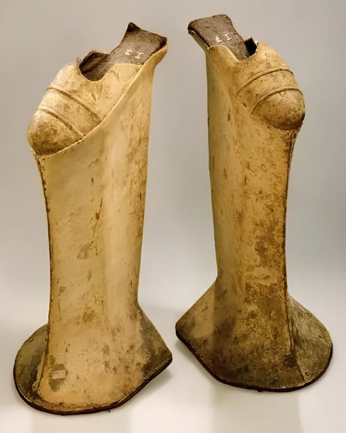 Pair of historical high-heeled shoes with exaggerated soles, showing the side of history that didn’t make textbooks.