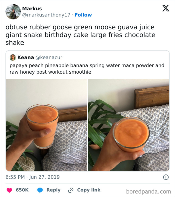 A hand holding a glass of orange smoothie inside a cozy room with plants and patterned bedding, meme style.