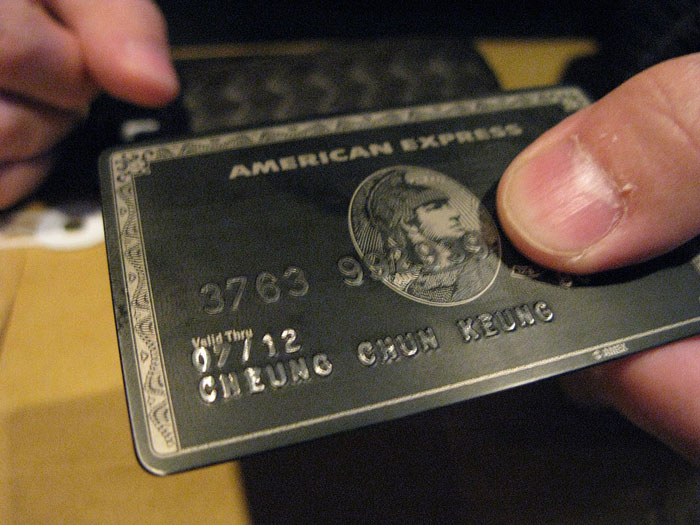 Close-up of a hand holding an American Express credit card, unrelated to Diddy’s disgusting eating habits revealed by staff. Close-up of a hand holding an American Express credit card, unrelated to Diddy’s disgusting eating habits revealed by staff.