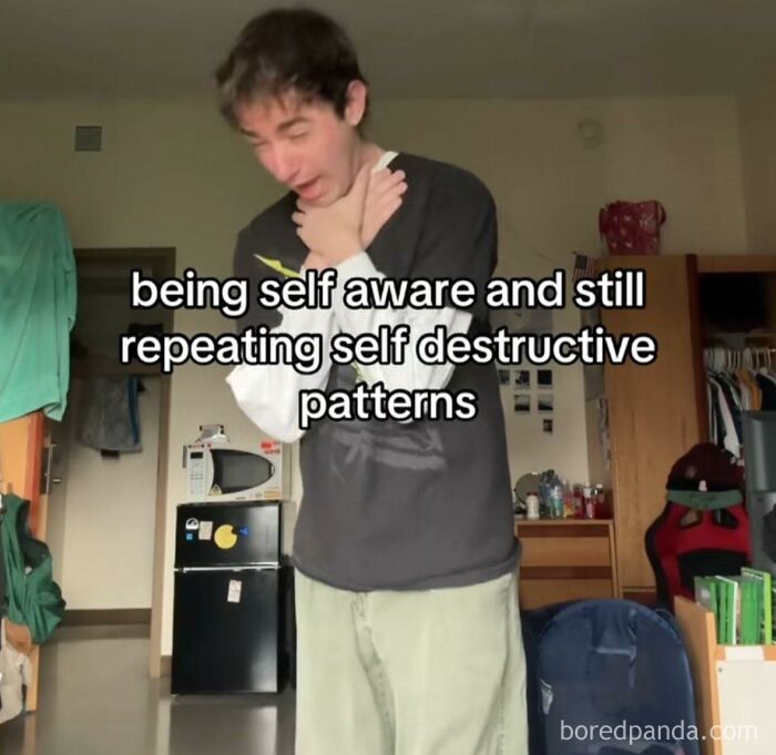 Young man in casual clothes acting dramatic with text about self destructive patterns, funny pics for mental breakdowns scrolling.