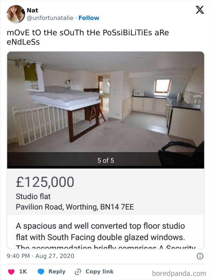 Loft studio flat with a bed suspended over the staircase showing a dumb interior design decision.