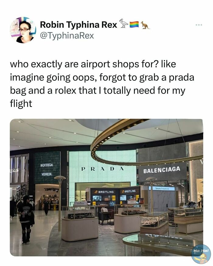 Tweet mocking airport shops with luxury brand stores like Prada, Balenciaga, and Breitling in a modern airport setting.