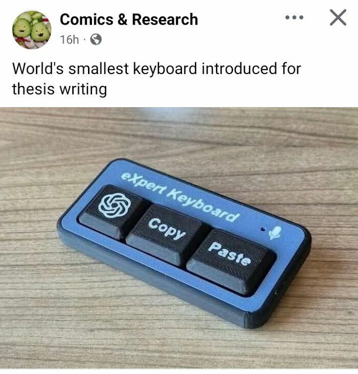 Mini keyboard with copy, paste, and AI logo keys on a wooden surface, perfect for funny random memes.