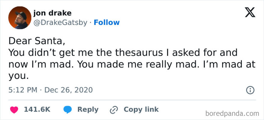 Tweet from comedian Jon Drake humorously complaining to Santa about not receiving a thesaurus, shared in funny Twitter posts.