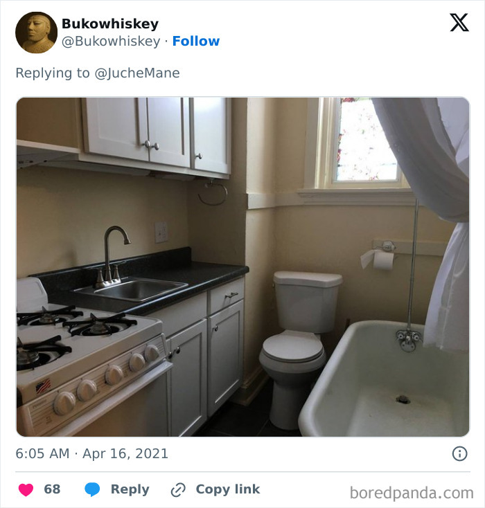 Small kitchen with stove and sink directly adjacent to a toilet and bathtub, illustrating dumb interior design decisions.