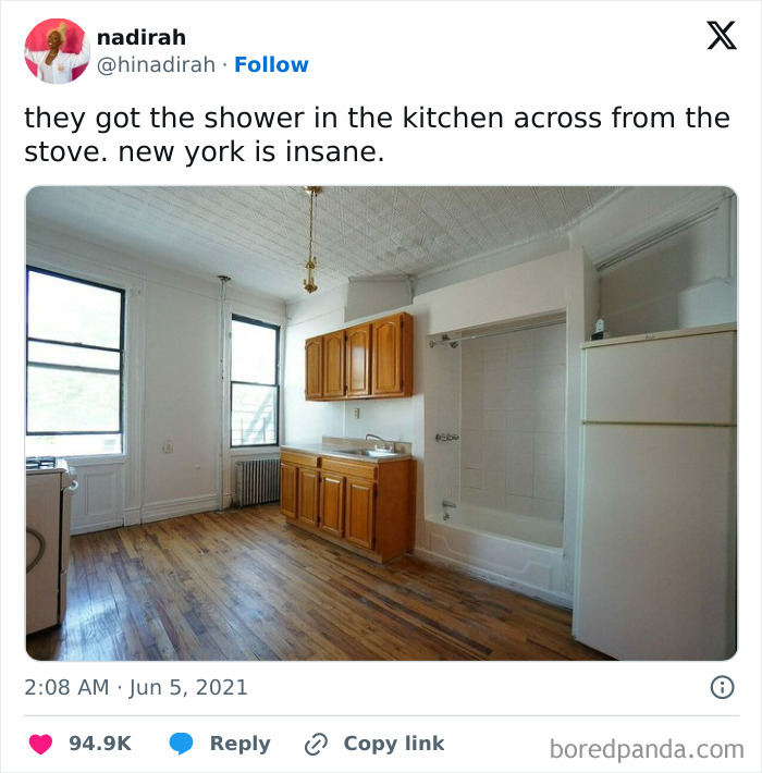 Kitchen with bathtub shower and stove nearby, illustrating dumb interior design decisions lacking common sense.