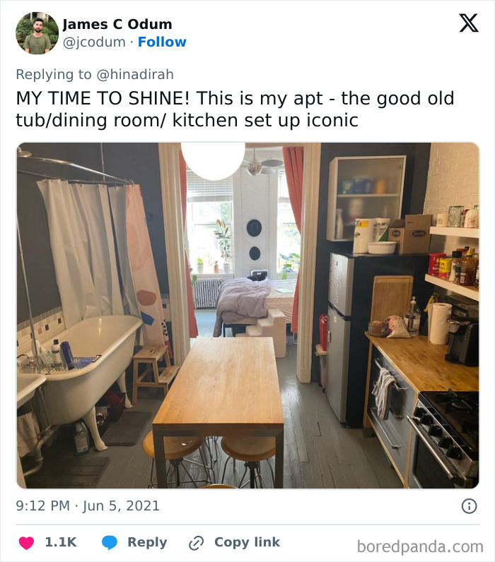 Small apartment with a bathtub in the kitchen area showing a dumb interior design decision and poor common sense.