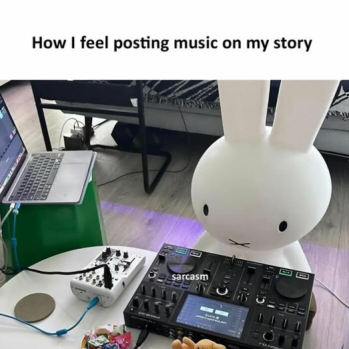 Miffy bunny figurine as DJ with music mixer and laptop, illustrating hilarious memes about posting music on stories.