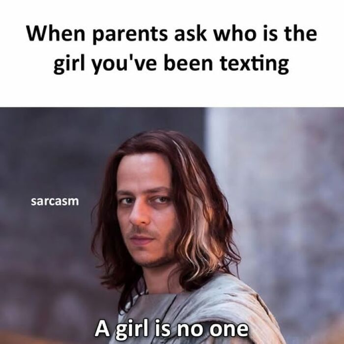 Man with long hair looking serious in a hilarious meme about texting, emphasizing sarcasm and funny Facebook page content.