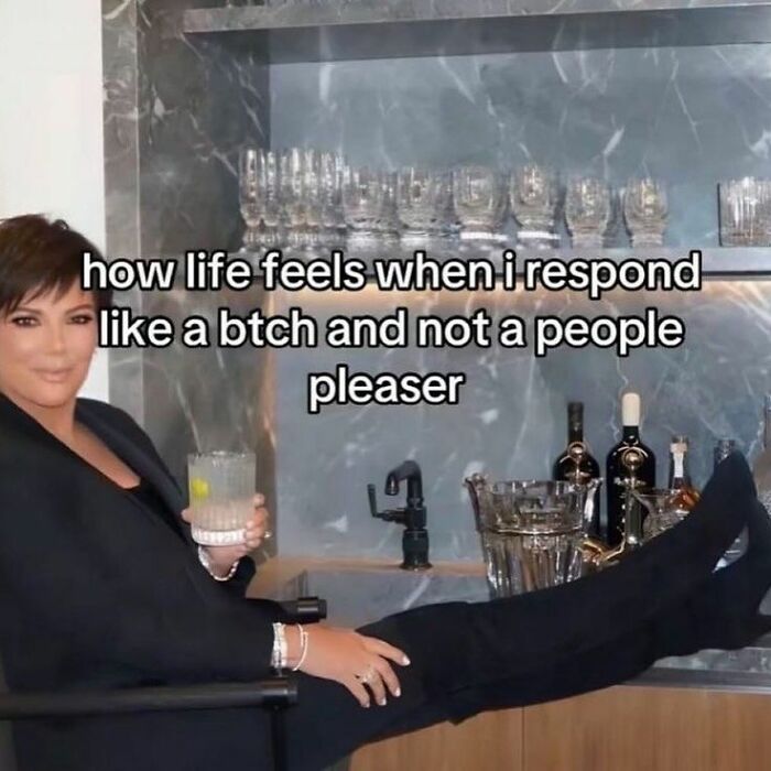 Woman relaxed with drink in hand by bar, caption about confidence, featuring cute and wholesome posts theme.